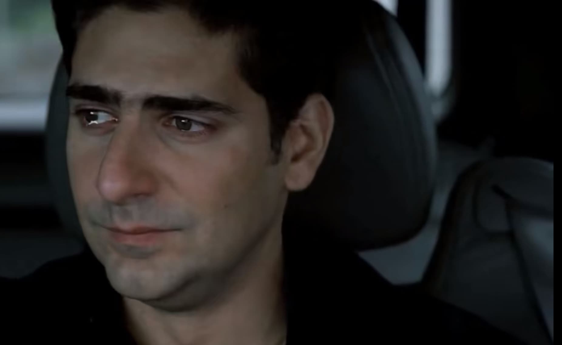 Chris sad in car