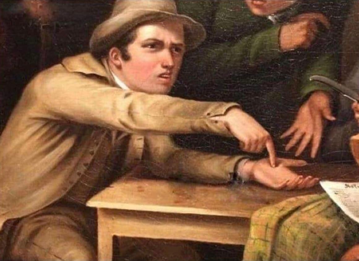 Man pointing at hand