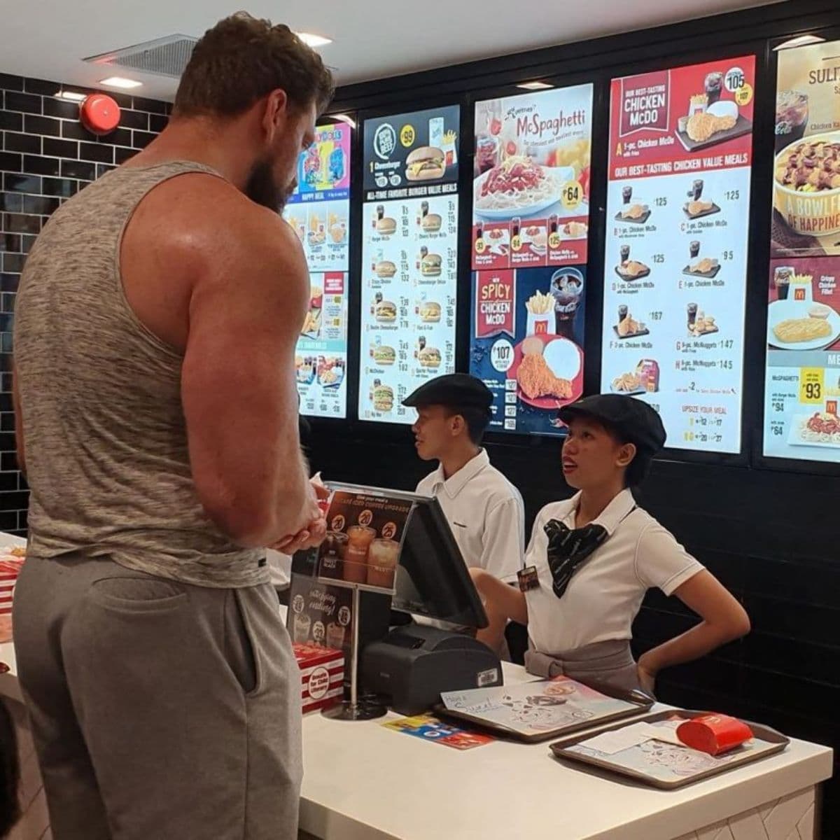 Buff guy ordering McDonalds