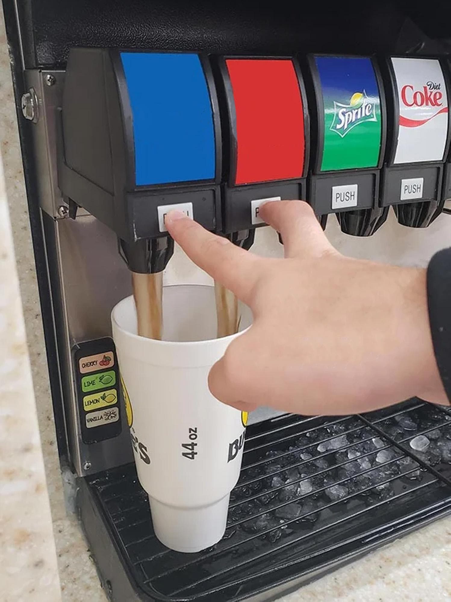 Soda fountain mixing drinks