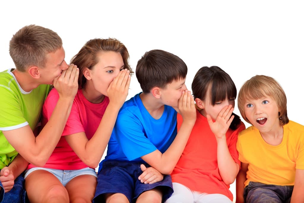 Telephone game kids whispering
